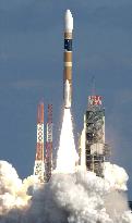 (CORRECTED)(1)Japan's H-2A rocket lifts off with 4 satellites